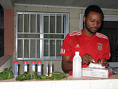 Anthony Agbor, co-author of the study and field site manager at several PanAf sites, prepares samples for processing in the field. (Picture: MPI-EVA PanAf)